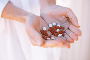 medication-pills-on-persons-hands